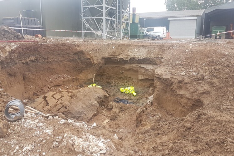 The excavated pit was unsupported when the employee went into it