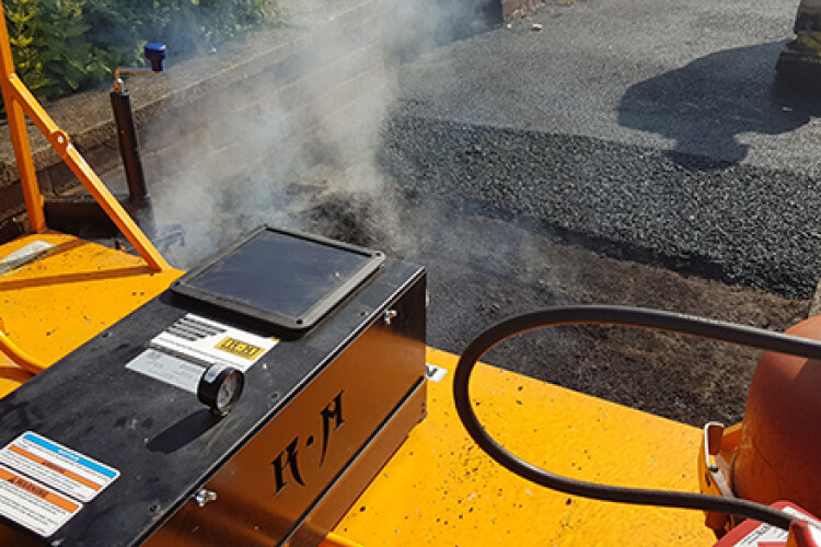 Infrared technology heats up the worn asphalt