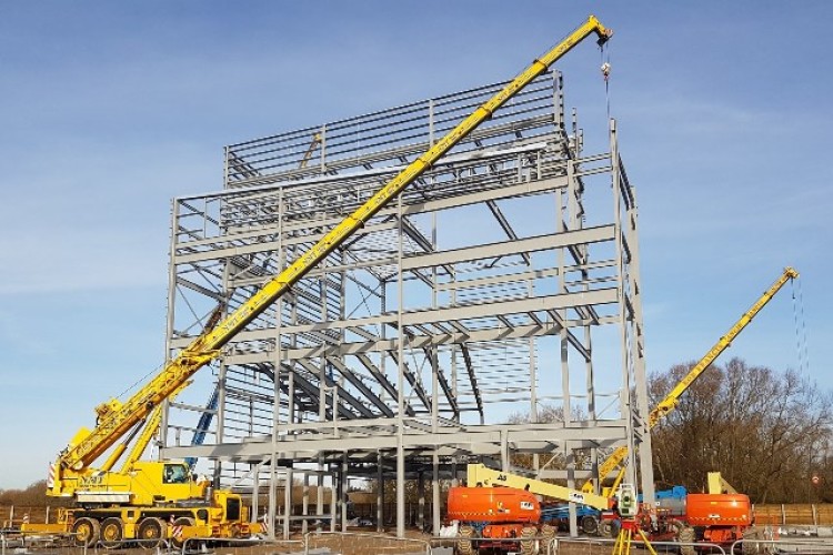 NMT Crane Hire helps hang steel for the new 14-screen cinema complex