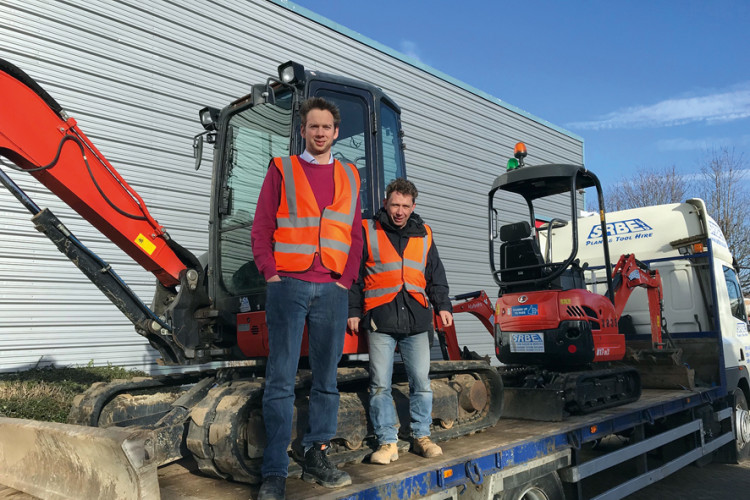 Francis Marx (left) with Dave Slaymaker who joined SRBE as a cleaner 24 years ago. Slaymaker is now SRBE's plant manager