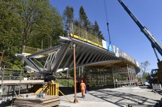The bridge's stainless-steel skeleton was brought to site in four pieces The bridge's stainless-steel skeleton was brought to site in four pieces