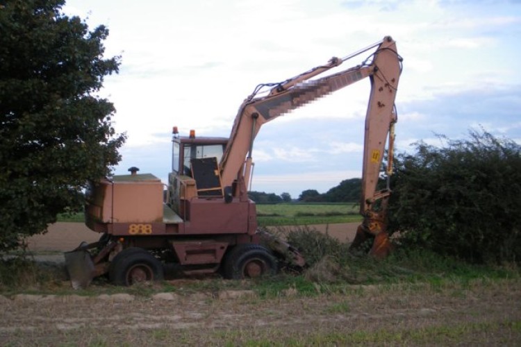 The old excavator that Mr Collins was trying to move