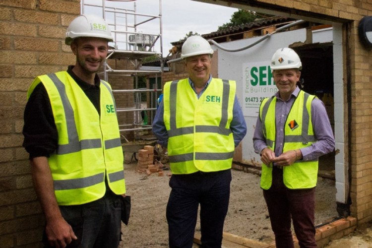  Left to right are SEH French Building general foreman Adam Constable, managing director John Ault and One Group Construction chief exec Richard Neall