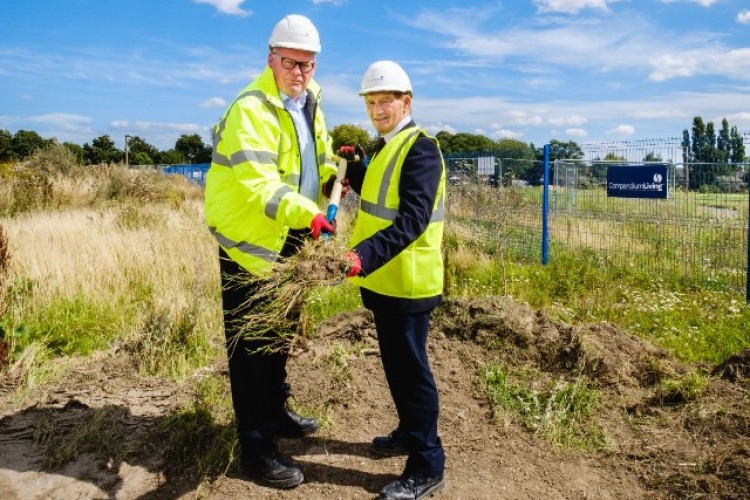 Compendium Living managing director Dave Bullock, left, cuts turf with Hull city councillor John Black 