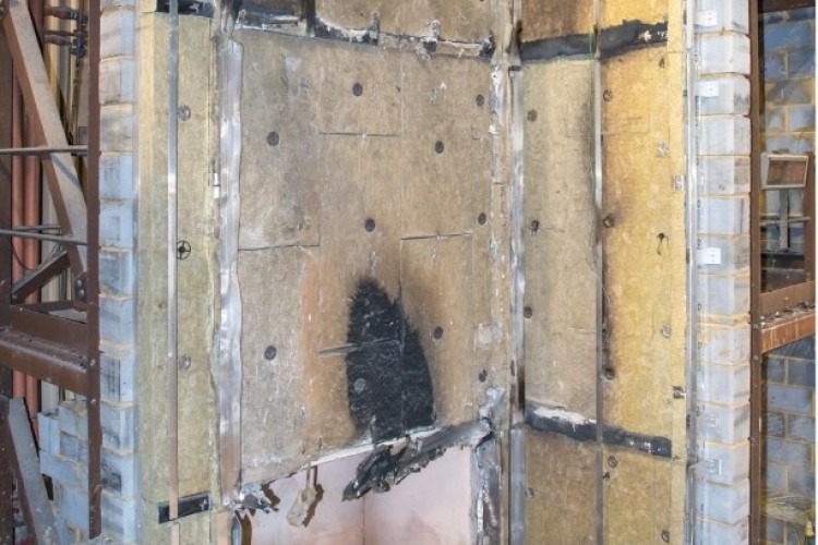 This is what the cladding system looked like after the fire test, following removal of ACM panels