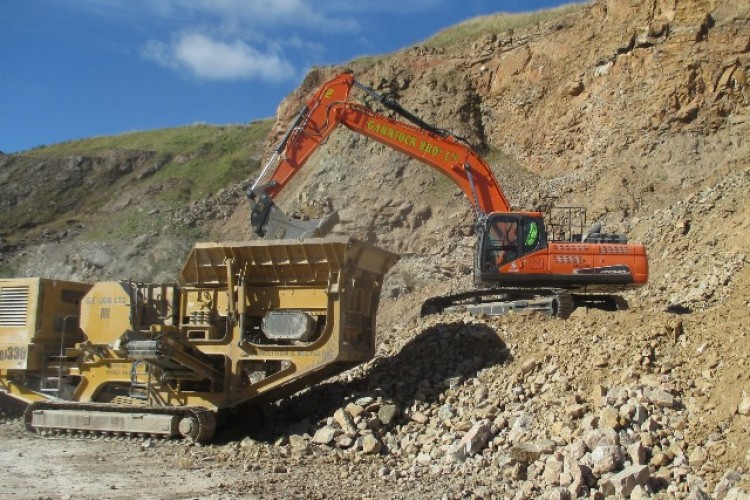 Doosan DX340LC-5 at work in Breedon&rsquo;s Boyne Bay Quarry. The DX225SLR-3 is below.