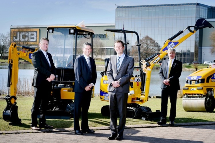 At JCB World Headquarters are (left to right) Jewson Tool Hire director Richard Pederson, JCB sales director Steve Smith, Jewson managing director Thierry Dufour and Gunn JCB managing director Paul Hartshorn