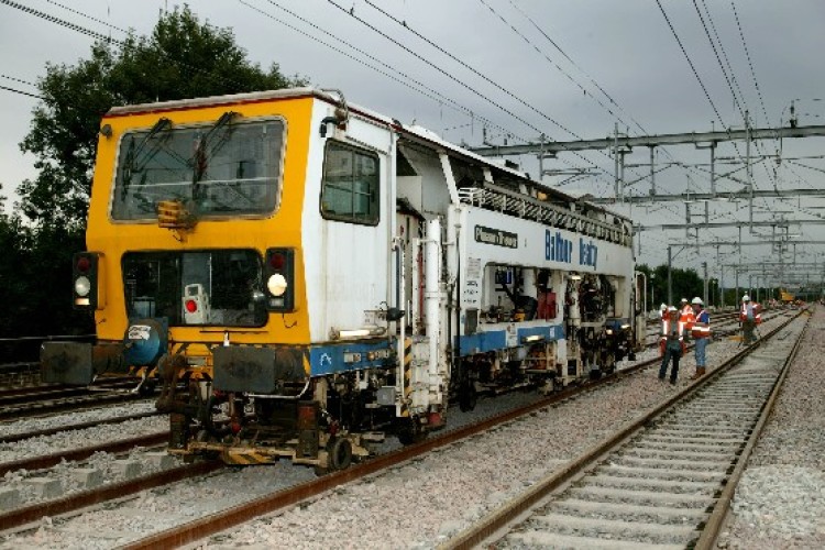 An on track machine, or tamper