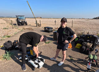 Survey technician Aimee Cooper (right) operated the robot on site