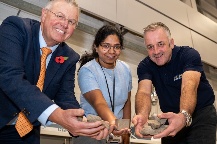 Scott Bros directors Bob Borthwick (left) and Peter Scott (right) with Teesside University structural engineering lecturer Thadshajini Suntharalingam (centre) with samples of the waste clay that make up the prototype bricks