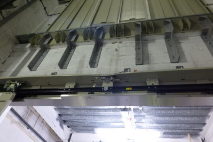 the lift shaft wall