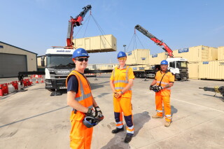 Left to right are Mobile Mini UK HGV driver Simon Teague, transport manager Andy Cowell and lifting operations manager Nick Sesevic