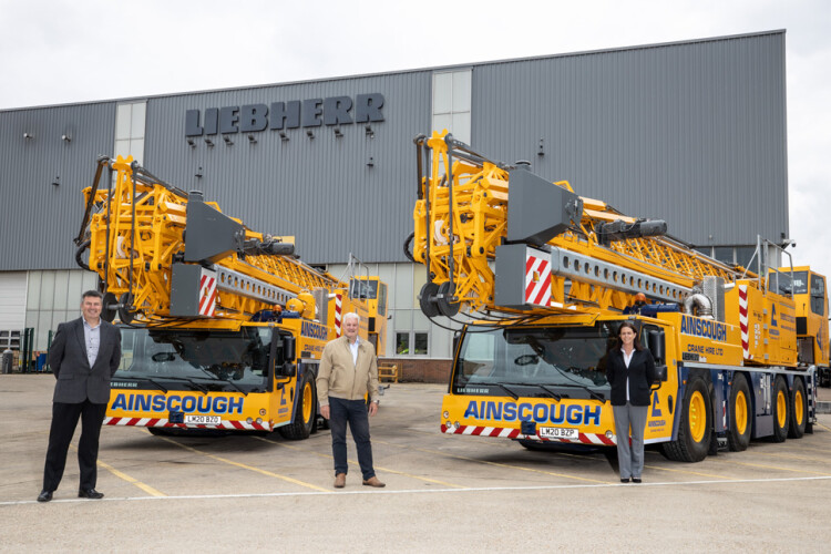 Left to right are Liebherr GB managing director Richard Everist, Ainscough heavy cranes director Andrew Spink and Liebherr sales manager Shola Russell with the new crane