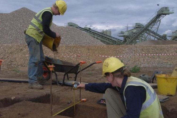 Archaeologists work on their find in Kingsmead Quarry 