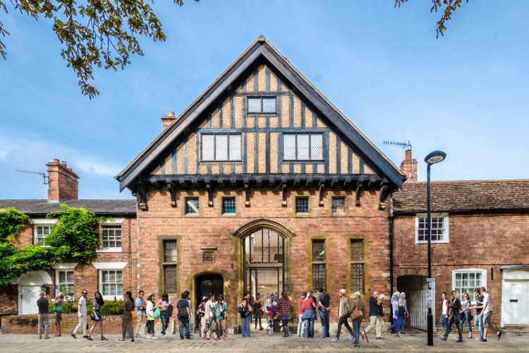 Artist&rsquo;s impression of the new entrance to the RSC offices and Costume Workshop using the Grade II-listed 1887 former scene dock doors in Chapel Lane