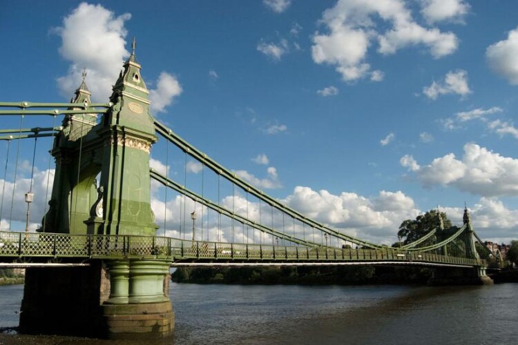 Hammersmith Bridge, designed by Sir Joseph Bazalgette, opened to traffic in 1887