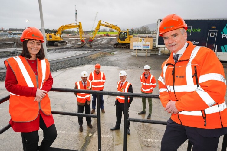 Northern Ireland infrastructure minister Nichola Mallon (left) with Translink chief executive Chris Conway (right), and representatives from Farrans Sacyr JV, Graham and Babcock