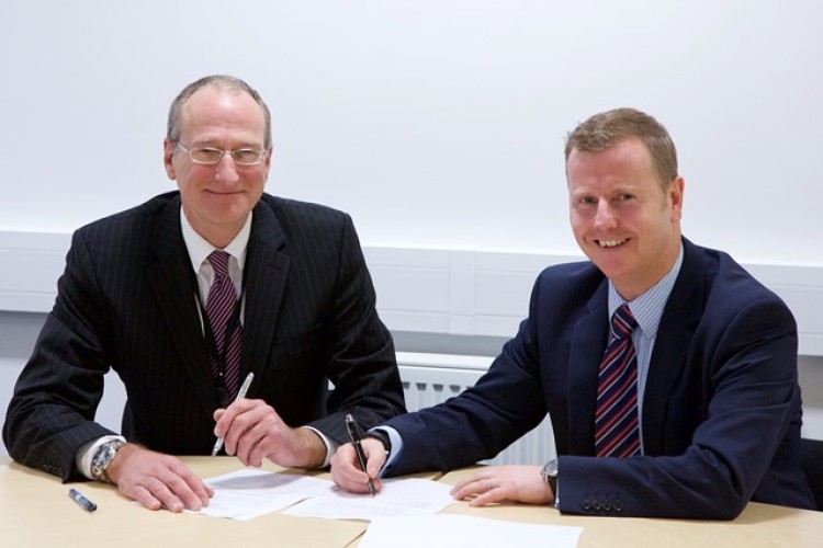 Severfield managing director Gary Wintersgill and university dean Peter Westland sign the pact