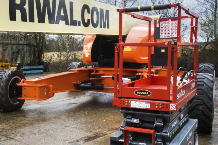 A JLG 1850SJ (left) and Skyjack scissor lift