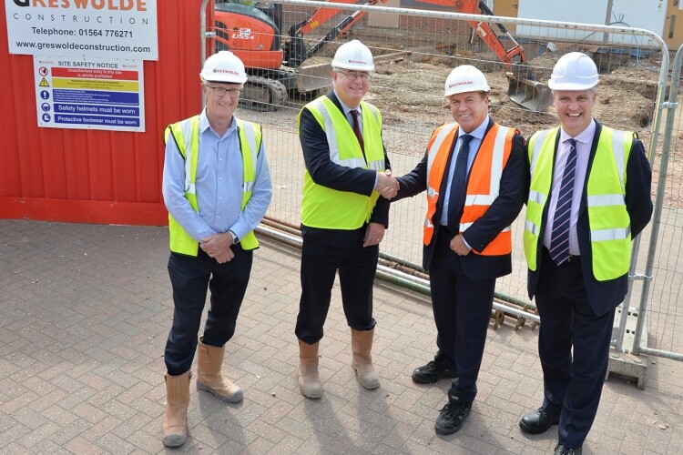 Malcolm Priest (second left) with (from left) director Chris Harrison, new MD Perry Stewart and finance director Shaun Walsh. Picture by Andrew Carpenter Photography.