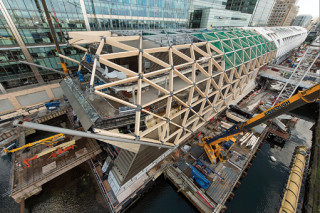 Wiehag has supplied glulam frames for Elizabeth line stations at Canary Wharf (pictured) and Abbey Road