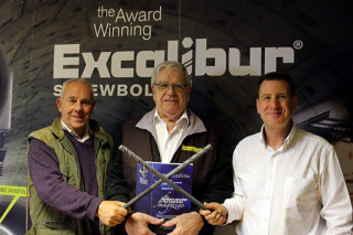 Inventor Charles Bickford (centre) collected his second Queen's Award for Enterprise in 2016