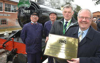 From left: John Cruxon (driver), Chris Smith (fireman), Richard Johnson (chairman GWSR) and Lord Richard Faulkner of Worcester (patron of the GWSR) at Broadway station's formal opening