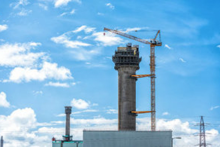 The Tower crane is tied to the chimney stack in three places