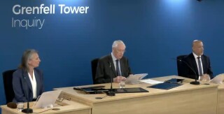 The Grenfell Inquiry panel members Thouria Istephan (left) and Ali Akbor (right) listen to chair Sir Martin Moore-Bick present their report