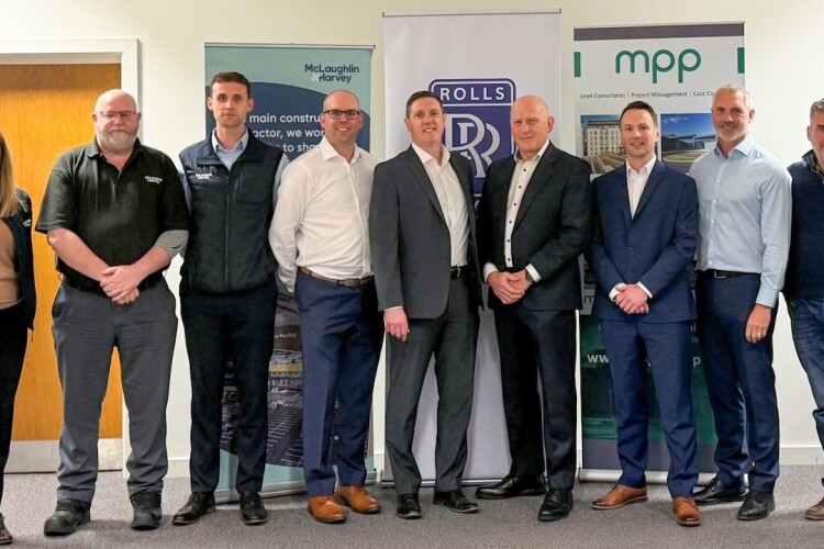 Members of the Rolls-Royce and McLaughlin & Harvey teams at the signing