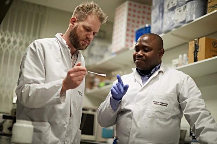 Robert Atkin (left) tests Pirtar with an academic from Leeds University