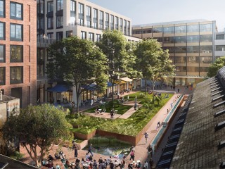 View of the new Dock Office Courtyard community square, looking towards Building A2 and the Leisure Centre entrance