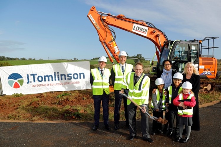 At the ground breaking ceremony were (l-r): Andrew Pollard, Place Partnership; Darroch Baker, J Tomlinson; County councillor Marcus Hart; headteacher Tasnim Koser; former head Carol Newton; and pupils Kyren, Aaqib and Amber.