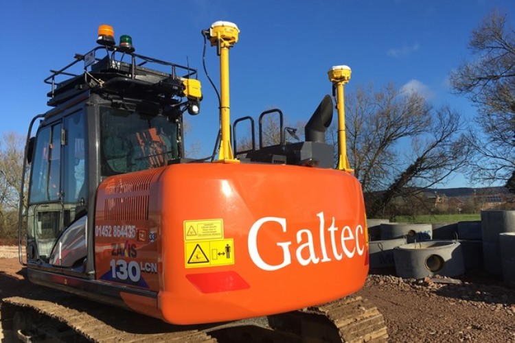 Hitachi excavator rigged with Trimble GPS technology