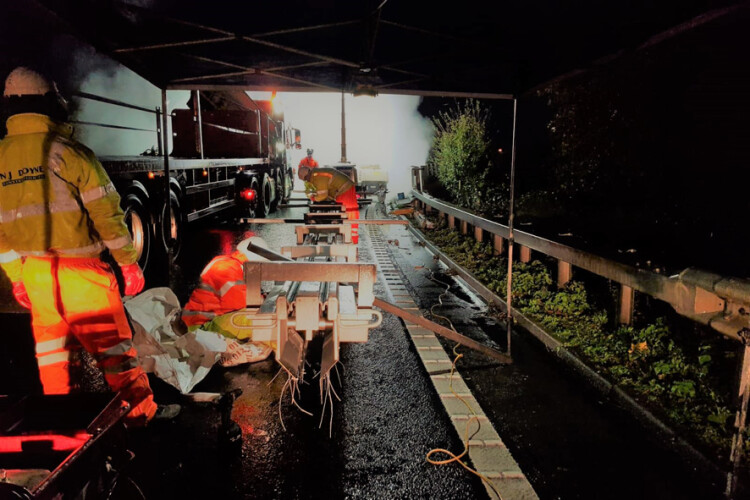 One of the expansion joints is inspected prior to its install