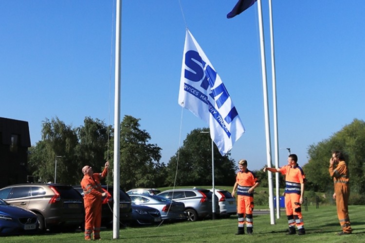 The SMT flag is raised at the Duxford headquarters of what was Volvo Construction Equipment GB