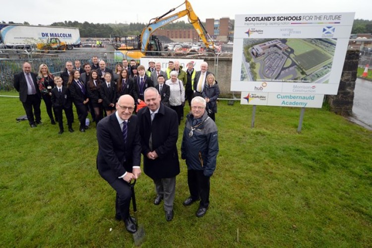 Deputy first minister John Swinney, head teacher Mark Cairns and North Lanarkshire Council depute provost Tom Castles