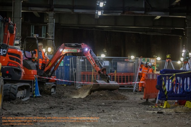  LUL customised SiteZone system on digger worker with tag at back of hard hat