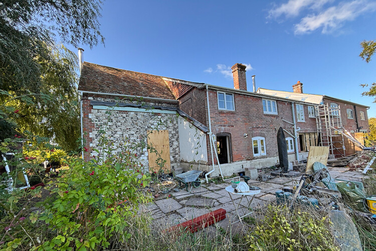 The house, on the left, is semi-detached. The neighbouring property was already sitting at a higher level, out of the risk of flooding