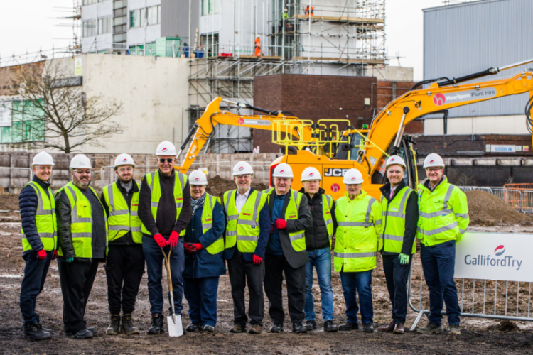 Stakeholders assemble for the ground breaking photo opportunity