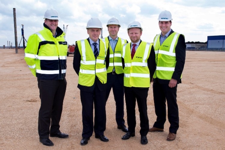 Pictured on site are, from left, Siemens project director Finbarr Dowling; VolkerFitzpatrick md Richard Offord; VolkerFitzpatrick commercial director Jonathon Suckling; Siemens project general manager Shaun Cray; and Siemens project commercial director Ro
