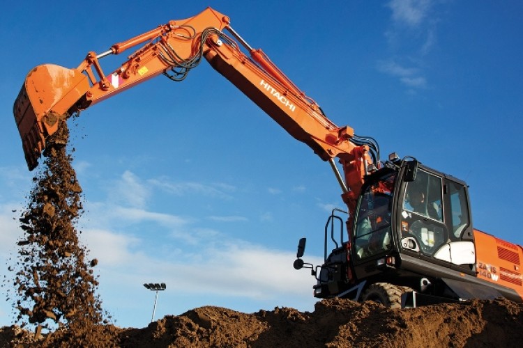 A Hitachi ZX140W-5 wheeled excavator