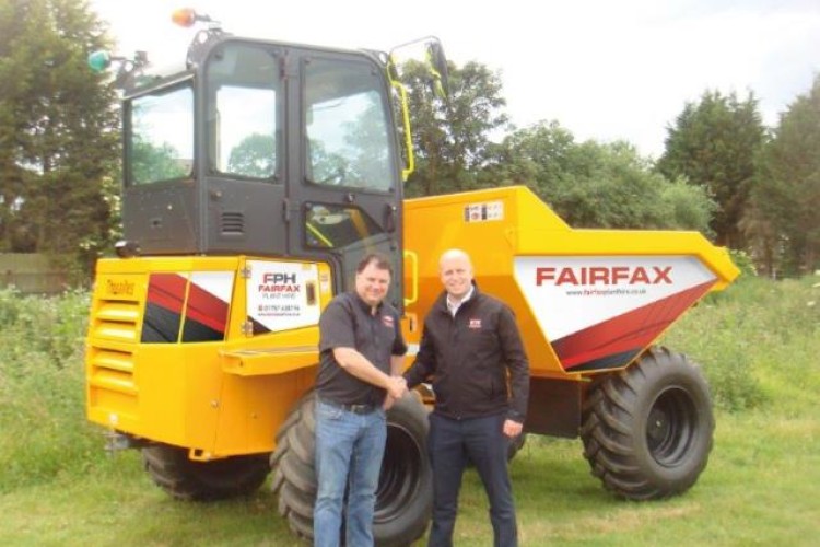 Fairfax director Mark Love (left) takes delivery from BTE sales director Brian Conn