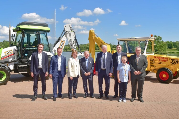 From left to right are Patrick Flannery, George Bamford, Mary Flannery, Anthony Bamford, Pat Flannery Snr, Paul Flannery, Thomas Flannery and Martin Flannery