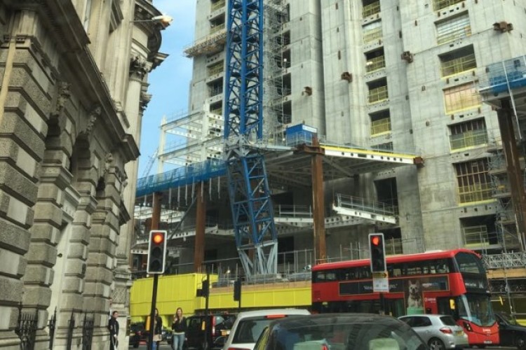 The bottom section of the crane is about 20 degrees off vertical