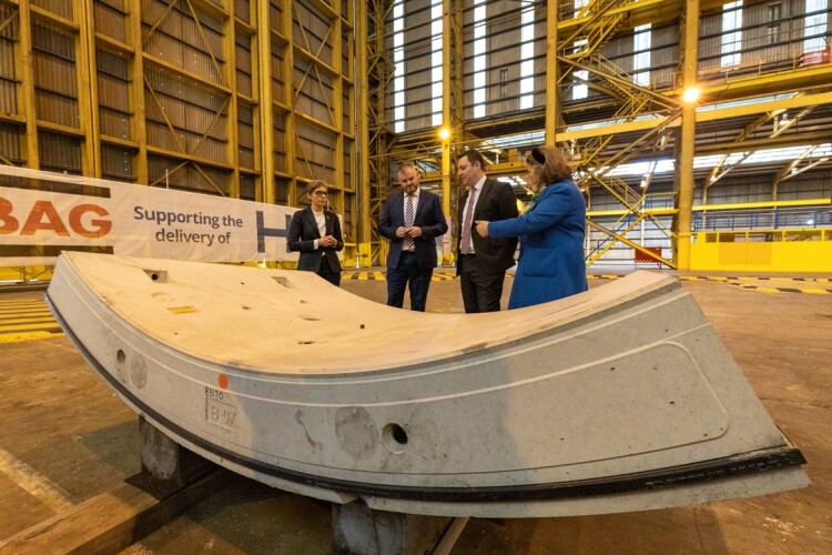 HS2 minister Andrew Stephenson (second left) is shown a tunnel lining segment 