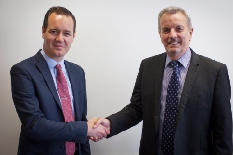 EDP managing director Mark Haydock (left) with IOM chief executive Rob Aitken (right)