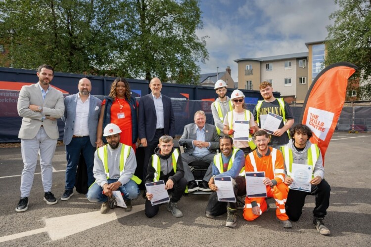 Andy Hill, founder and group chief executive of The Hill Group with the first cohort of students at The Skills Centre