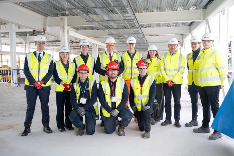 Scottish first minister John Swinney visiting the airport with Nick Rowan and early career team members