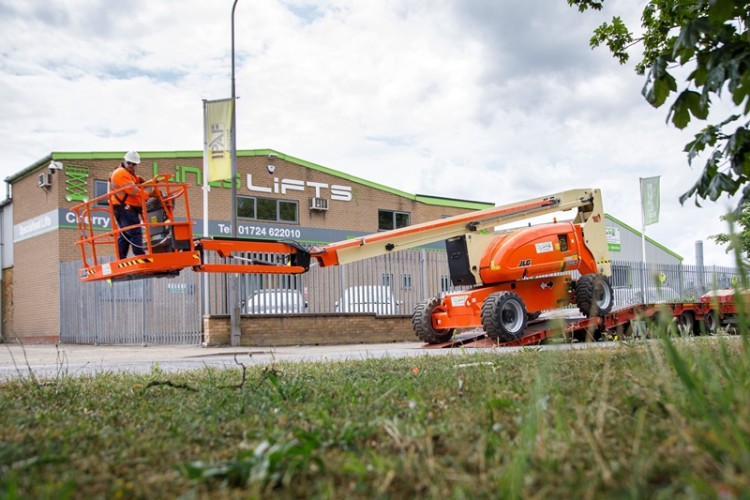 Taking delivery of a new JLG boom lift